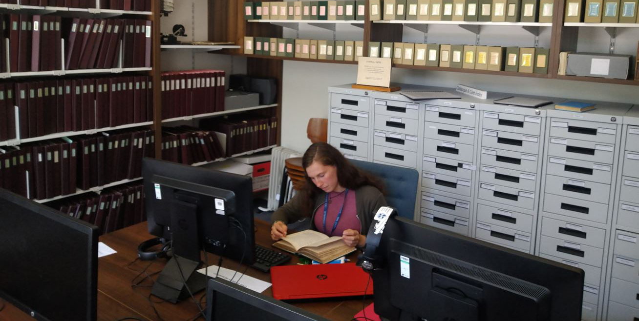 Emma Carroll exploring collections at the National Library of Scotland.